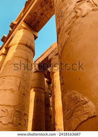 Photo of the ancient columns of the ancient Karnak temple in Luxor - Thebes ruins Egypt