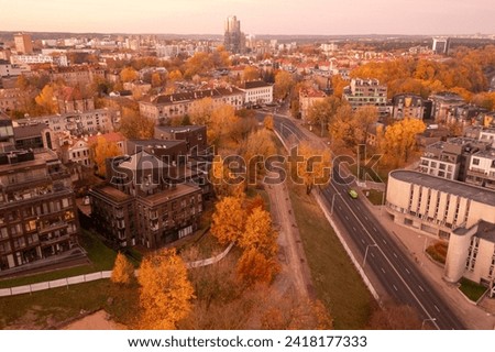 Drone photography of city downtown district during autumn sunny day