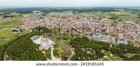 Aerial view of the Spanish town of Íscar in Valladolid, with its famous castle in the foreground.