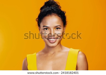 Face woman make-up black yellow creative beauty smile colourful african portrait Royalty-Free Stock Photo #2418182401