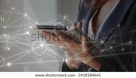 Image of network of connections over caucasian businesswoman using tablet. Global business, connections, computing and data processing concept digitally generated image.
