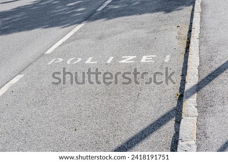 Police parking place. Concept of control and censure.  Polizei translated from German as police. 