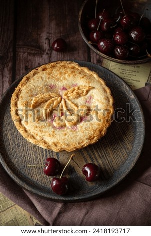 Cherry pie on dark brown background 
