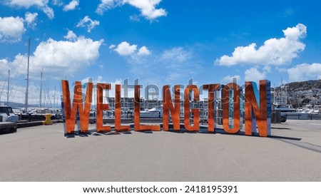 Panoramic skyline of Wellington downtown Lambton harbor with letters sign representing Wellington.