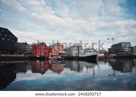 Buildings and coast in Tromsø, Norway Royalty-Free Stock Photo #2418203717