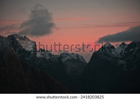 Sunrise and mountains in Norway Royalty-Free Stock Photo #2418203825