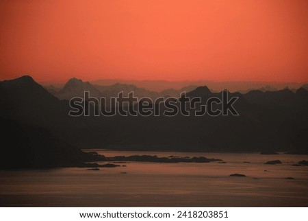 Sunrise and mountains in Norway Royalty-Free Stock Photo #2418203851