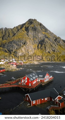 Red buildings in Å, Norway Royalty-Free Stock Photo #2418204015
