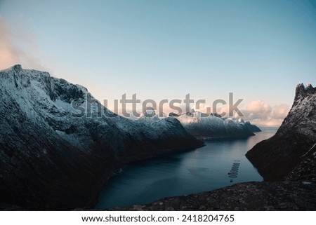 Sunset and fishing nets in Norwegian mountains Royalty-Free Stock Photo #2418204765