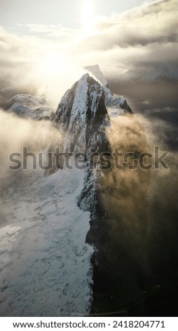 Segla Mountain clouds in Norway Royalty-Free Stock Photo #2418204771