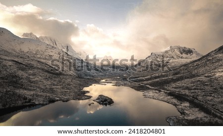 Sunset and reflection in Norwegian Mountains Royalty-Free Stock Photo #2418204801