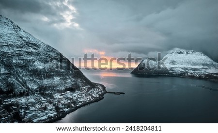Sunset and mountains in Gryllefjord, Norway Royalty-Free Stock Photo #2418204811