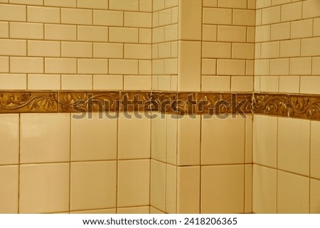 Elegant Cream and Gold Tile Design - Eye Level Corner View