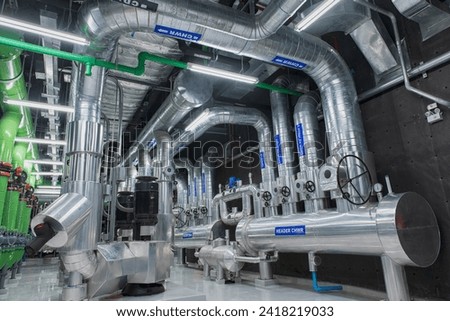 Industrial interior chiller and boiler HVAC heating ventilation air conditioning system and pipping line of Chill water pipe with Pre insulation Jacket in chiller  room.