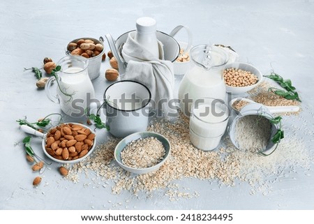 Various vegan plant based milk and ingredients stock photo