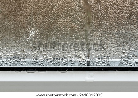 Condens on window glass indoors in cold season, humidity and no ventilation in room