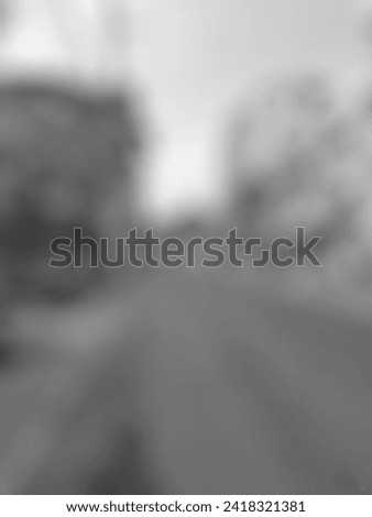 Defocuse street  with blurred background. Black and white road.