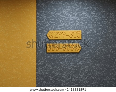 Yellow signs on a gray background. Signs on the wall of an office building with a gray background. Wooden sign on the wall, with space for your text.