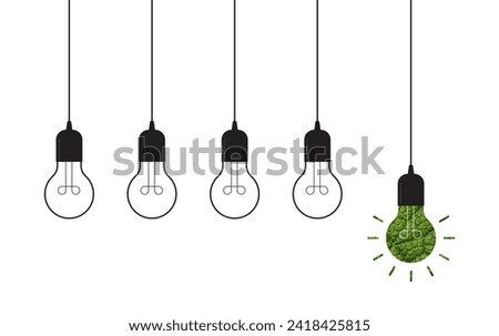 Hanging light bulbs with one glowing on white background. Concept of idea