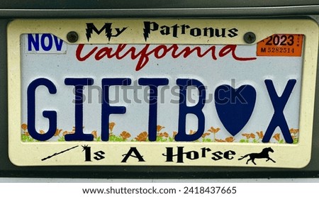California vanity license plate GIFTBOX with heart symbol Royalty-Free Stock Photo #2418437665