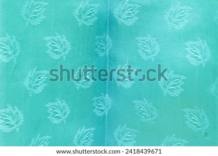Detail of the texture of a blue curtain motif