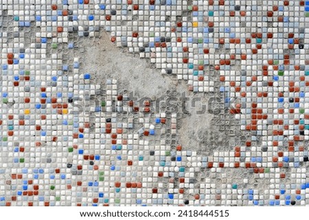 Ceramic mixed color mosaic tiles. Texture from a multi-colored small tile. Colorful small square randomly. High quality photo tiles.
