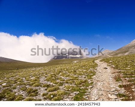 Footpath trail hiking in mountain peak, Mountain Olympus, Greece 