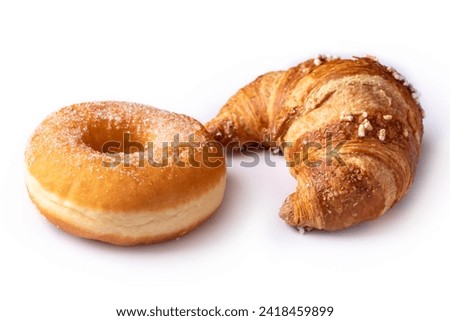 Fried donut and croissant, european desserts isolated on white background  Royalty-Free Stock Photo #2418459899