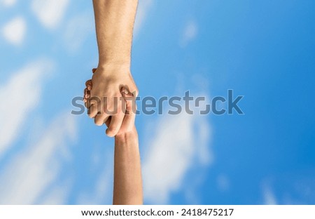 Giving a helping hand. Rescue, helping gesture or hands. Lending a helping hand.