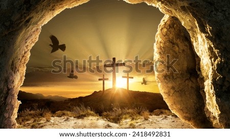 Resurrection - Empty Tomb With Rolled Stone And Doves Flying Out Of Cave - Crosses On Hill At Sunrise Royalty-Free Stock Photo #2418492831