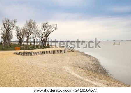 Beach at The Neusiedl am See lake, Austria, Europe. Royalty-Free Stock Photo #2418504577