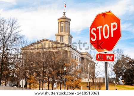 View of Stop Sign with Tennessee State Capitol building on background
