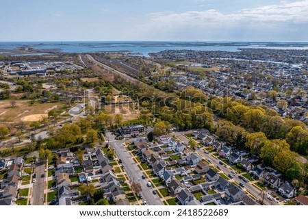 Aerial View of Long Island town leading to the ocean.