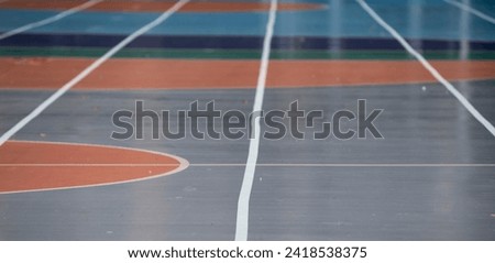 Running track in a sports hall. Horizontal view. Blurred background.