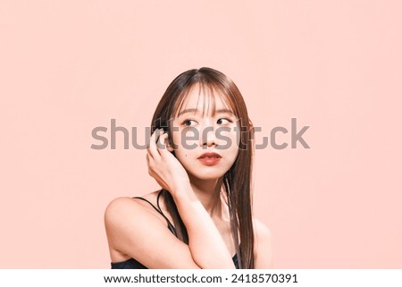Beauty, skin care and cosmetics concept of young asian woman with korean makeup. Royalty-Free Stock Photo #2418570391