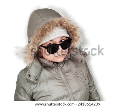 Asian woman wearing winter jacket and sunglasses, isolated on white background