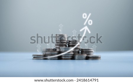 Growth of percentage sign on coins, increase interest financial banking and business investment profit dividend growth, interest rates, raising interest rates, inflation, returns on investments.