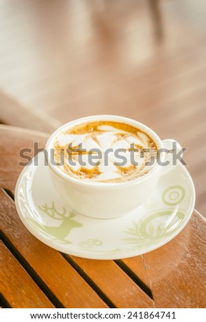 Latte coffee cup in coffee shop - vintage effect style pictures