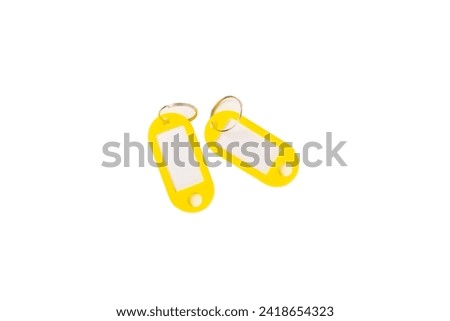 Plastic keychain of different colors with a place for a signature isolated on a white background. Bunch of keys with keychain, isolated on White. Mock-up keychain.