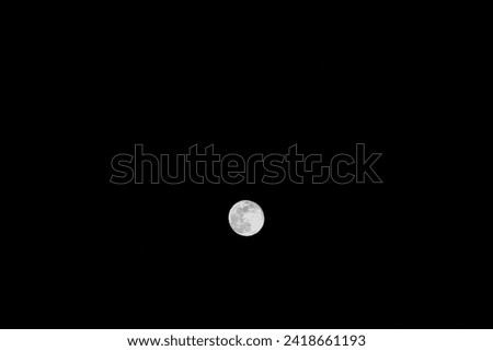 The full moon in the night sky in the province of Alicante, Costa Blanca, Spain, December  27, 2023