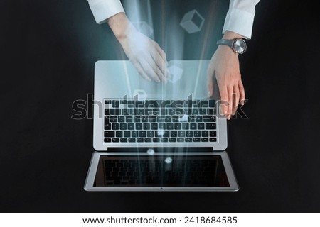 Speed internet. Woman using laptop on black background, top view. Motion blur effect symbolizing fast connection