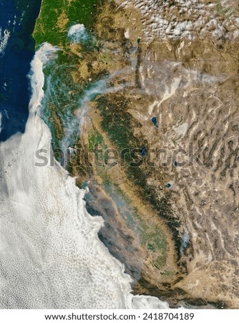 Fires and smoke in Oregon and California. Fires and smoke in Oregon and California. Elements of this image furnished by NASA.