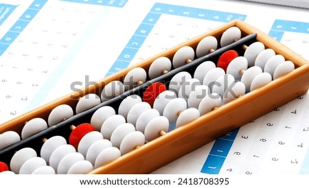 abacus for mental arithmetic. High quality photo Royalty-Free Stock Photo #2418708395