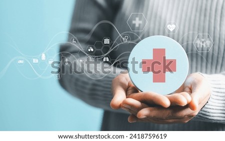 Woman hand holding plus icon for technology healthcare medical icon. access to welfare health and copy space, medical health care with medical network connection, Health insurance health concept.