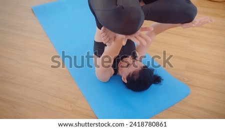 pretty young woman do meditation practice yoga for peace doing stretching exercise, fitness or spiritual health. Balance, mindfulness and wellness and relax at home, breathing and mindset training