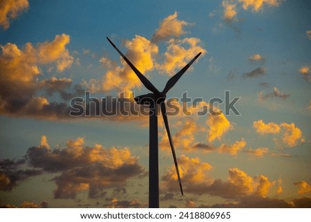 Symbol image: Wind turbines, wind farm at the sunrise (Composing)