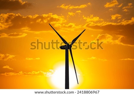 Symbol image: Wind turbines, wind farm at the sunrise (Composing)