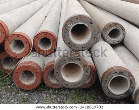 industrial concrete staked pile or spun pile for construction foundation.   Concrete Pile for Foundation of Building. construction foundation work Royalty-Free Stock Photo #2418819703
