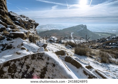 A rural Peak District National Park winter landscape scene. Panoramic view of Hen Cloud from The Roaches.