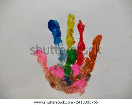 A colorful painting hand sign with water colour based